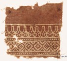 Textile fragment with linked diamond-shapes and stylized leaves