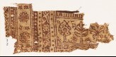 Textile fragment with stylized trees and three-layered rosettes