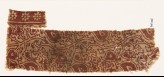 Textile fragment with stylized tendrils and leaves