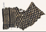 Textile fragment with linked chevrons, trefoils, and bands of dots