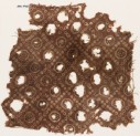 Textile fragment with bandhani, or tie-dye, imitation and rosettes (EA1990.479)