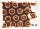 Textile fragment with rosettes in circles (EA1990.483)