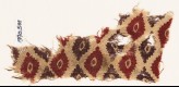 Textile fragment with indented ovals (EA1990.501)