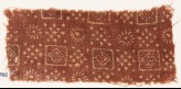 Textile fragment with squares, clusters of dots, and rosettes (EA1990.502)