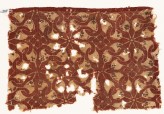 Textile fragment with interlocking spirals or rosettes (EA1990.509)