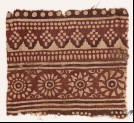 Textile fragment with rosettes and dots (EA1990.524)