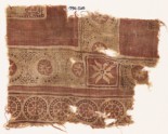 Textile fragment with rosettes in dotted frames (EA1990.528)