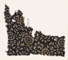 Textile fragment with swirling leaves and flowers (EA1990.53)