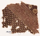 Textile fragment with small and large stars, and a dotted vine (EA1990.549)