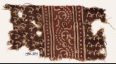 Textile fragment with stylized tendrils or hooks, and a dotted vine (EA1990.554)