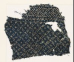 Textile fragment with rosettes and linked S-shapes made of dots