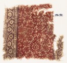 Textile fragment with scroll, flower-heads, and rosettes (EA1990.592)