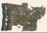 Textile fragment with rosettes and linked S-shapes made of dots (EA1990.60)