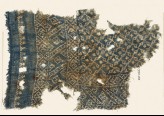 Textile fragment with rosettes and linked S-shapes made of dots