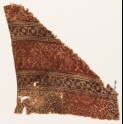 Textile fragment with bands of stylized plants, rosettes, and tendrils (EA1990.604)