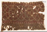 Textile fragment with interlocking circles (EA1990.624)