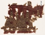 Textile fragment with cone-shapes and ornate floral designs (EA1990.635)