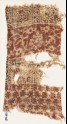 Textile fragment with arches, rosettes, and crossed tendrils (EA1990.637)