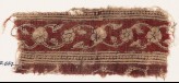 Textile fragment with vine, flowers, leaves, and lotus blossoms