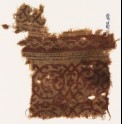 Textile fragment with vines forming circles