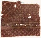 Textile fragment with flowers, cable pattern, stylized plants, and Arabic inscription