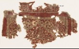 Textile fragment with medallion, floral patterns, and Persian-style script