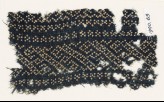 Textile fragment with dots arranged in a geometric pattern (EA1990.69)