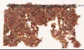 Textile fragment with quatrefoils and cartouches