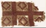 Textile fragment with squares and rosettes (EA1990.732)