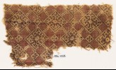 Textile fragment with linked squares, flowers, and tendrils (EA1990.758)