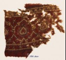 Textile fragment with interlacing tendrils and leaves (EA1990.800)