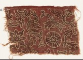 Textile fragment with curving vines, quatrefoil, and rosette (EA1990.802)