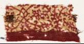 Textile fragment with interlacing tendrils and leaves (EA1990.834)