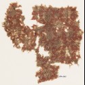 Textile fragment with linked circles and quatrefoils (EA1990.863)