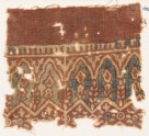 Textile fragment with arches and stylized plants (EA1990.916)
