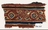 Textile fragment with leaves, rosette, and diamond-shape (EA1990.929)