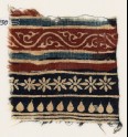 Textile fragment with bands of vine, rosettes, and tear-drops (EA1990.930)