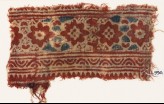 Textile fragment with flower-heads (EA1990.931)