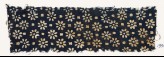 Textile fragment with rosettes and small squares (EA1990.94)