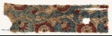 Textile fragment with interlacing tendrils and flower-heads (EA1990.944)