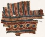 Textile fragment with linked diamond-shapes and chevrons (EA1990.964)