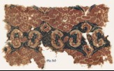 Textile fragment with linked medallions and rosettes