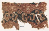 Textile fragment with linked medallions and rosettes
