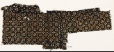 Textile fragment with flowers, rosettes, and squares (EA1990.98)