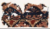 Textile fragment with tendrils and possibly leaves