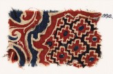 Textile fragment with stepped diamond-shapes and swirling plants