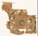 Textile fragment with part of a large rosette