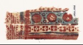 Textile fragment with circles and quatrefoils (EA1990.1008)