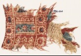 Textile fragment with stars, rosette, and crosses (EA1990.1014)