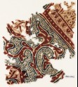 Textile fragment with tendrils and script